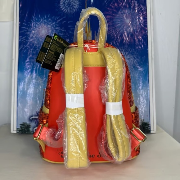 Loungefly Red and Cream Sequin Backpack with Bow